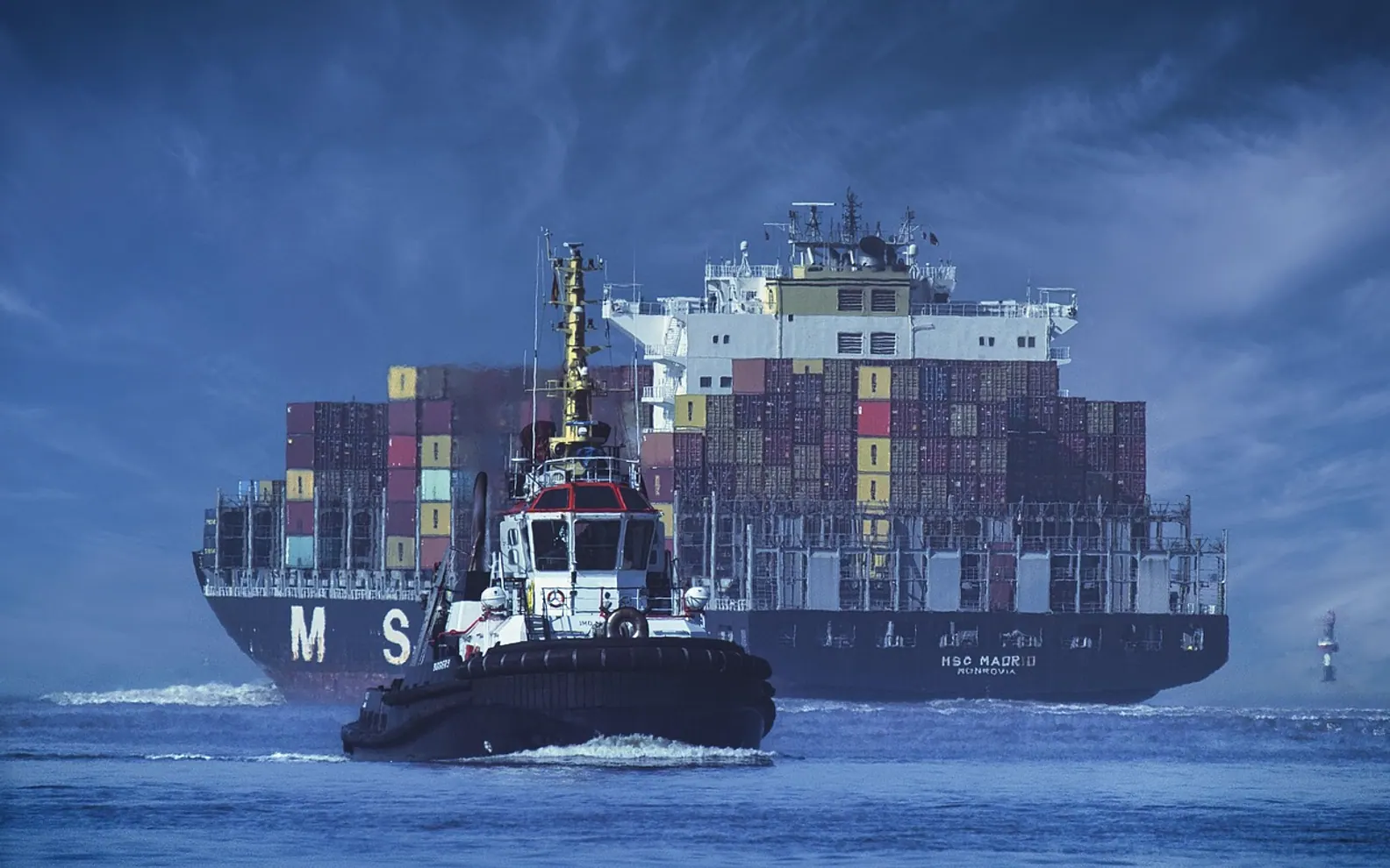 Ship, container ship and tractor