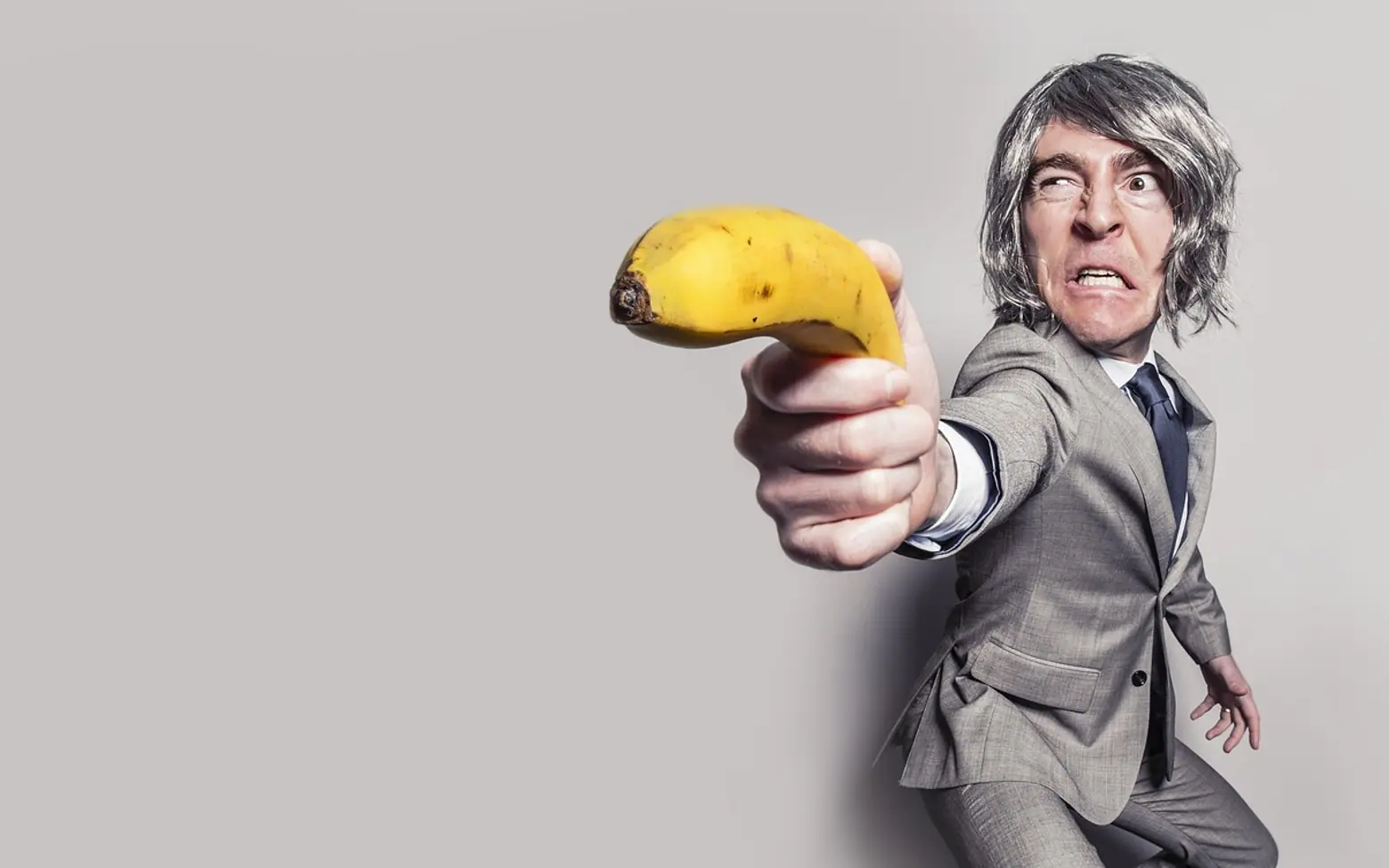 Suit, business man and banana